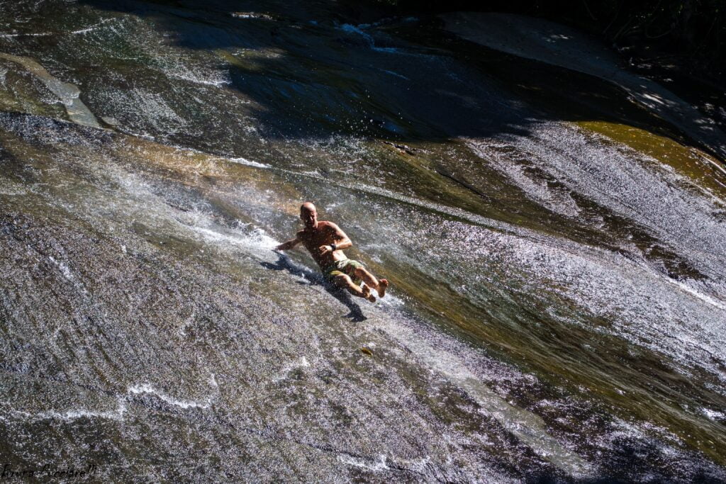 Having fun on the Toboggan rockslide-min