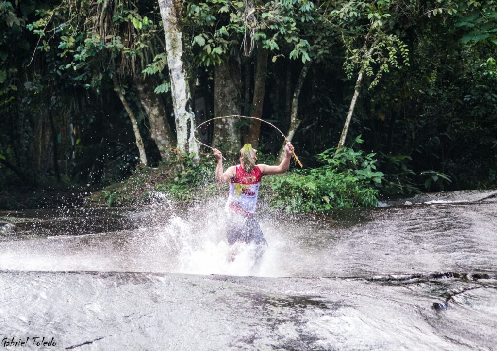 Rock surfer tricks at the Toboggan Waterfall-min